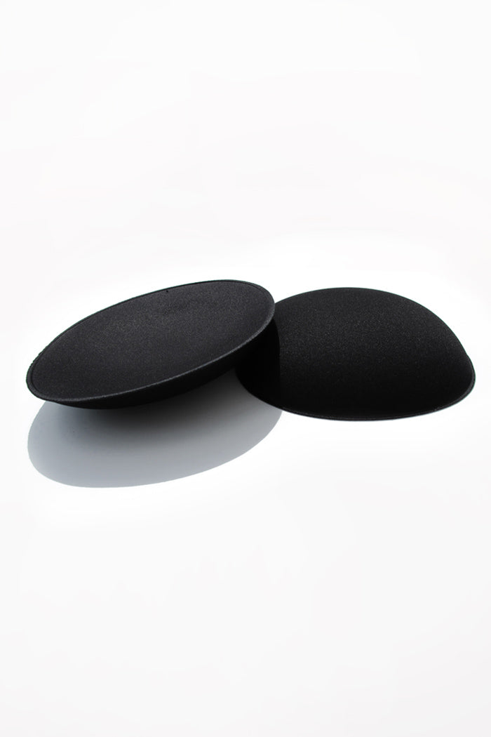 Profile of Black oval foam pads for adding curves or cushioning to the butt or hips.